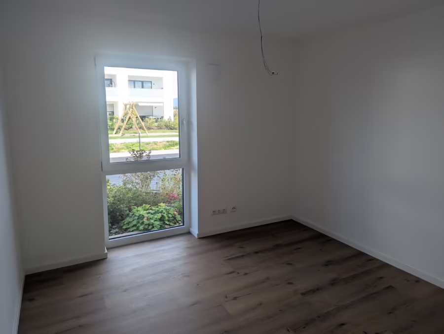 Moderne 4-Zimmer Erdgeschosswohnung (inkl. EBK) mit Terrasse und Garten! - Zimmer (72199)