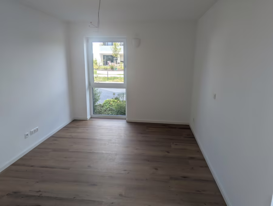 Moderne 4-Zimmer Erdgeschosswohnung (inkl. EBK) mit Terrasse und Garten! - Zimmer (72197)