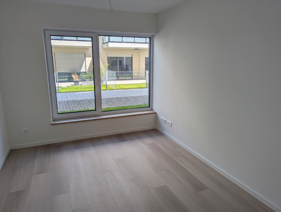 Neubauwohnung mit Garten, Einbauküche, Badewanne/Dusche nahe der Innenstadt! - Zimmer (62500)