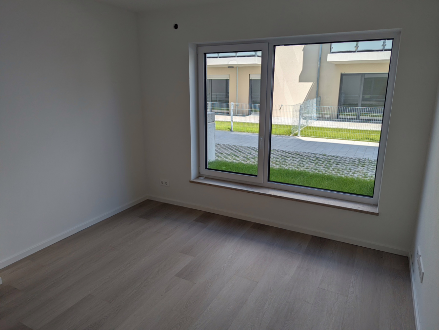 Neubauwohnung mit Garten und Einbauküche nahe der Innenstadt! - Zimmer (62523)