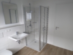 Bad - Einmaliger Ausblick in ruhiger Lage! Neubauwohnung mit Balkon in Süd-West Ausrichtung!