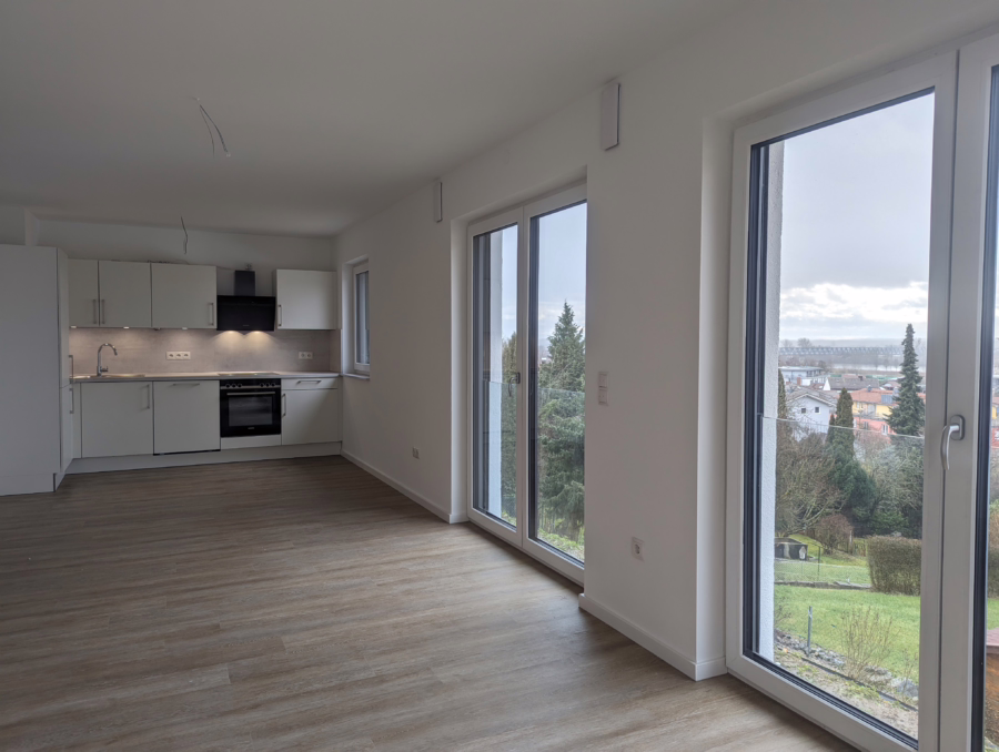 Einmaliger Ausblick in ruhiger Lage! Neubauwohnung mit Balkon in Süd-West Ausrichtung! - Wohnen/Essen/Kochen (48803)
