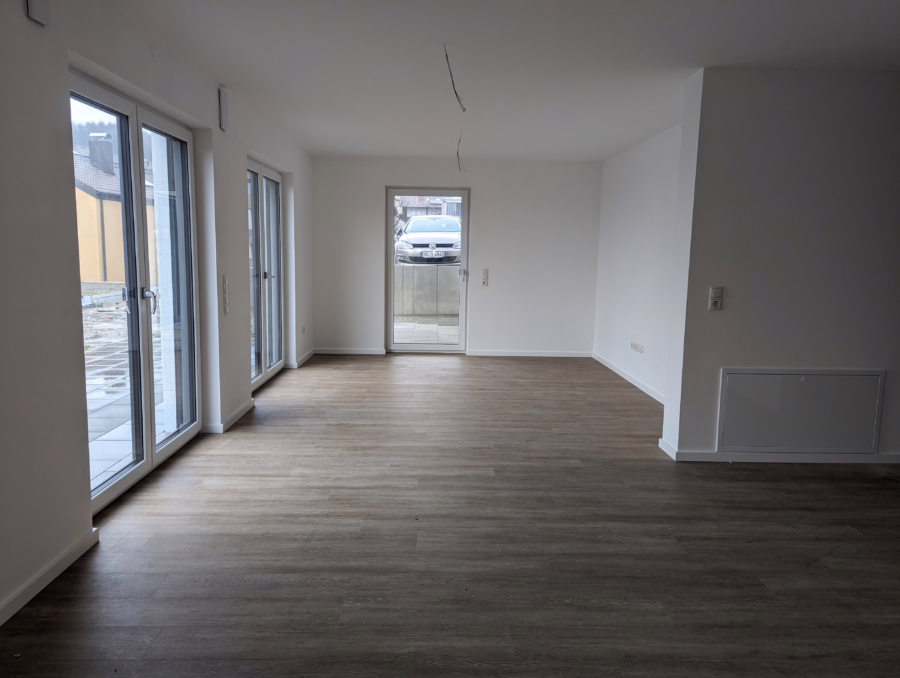 Einmaliger Ausblick in ruhiger Lage! Neubauwohnung mit Gartennutzung in Süd-West Ausrichtung! - Wohnen/Essen/Kochen (48788)