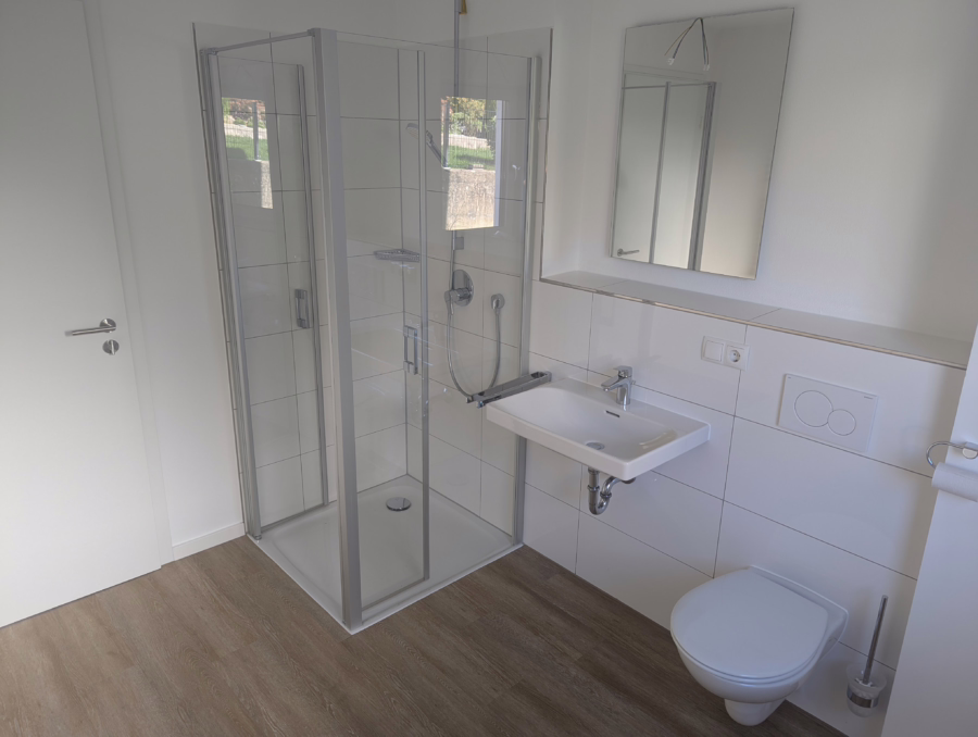 Ruhige Lage! Neubauwohnung mit Garten in Süd-West Ausrichtung! - Bad (58916)