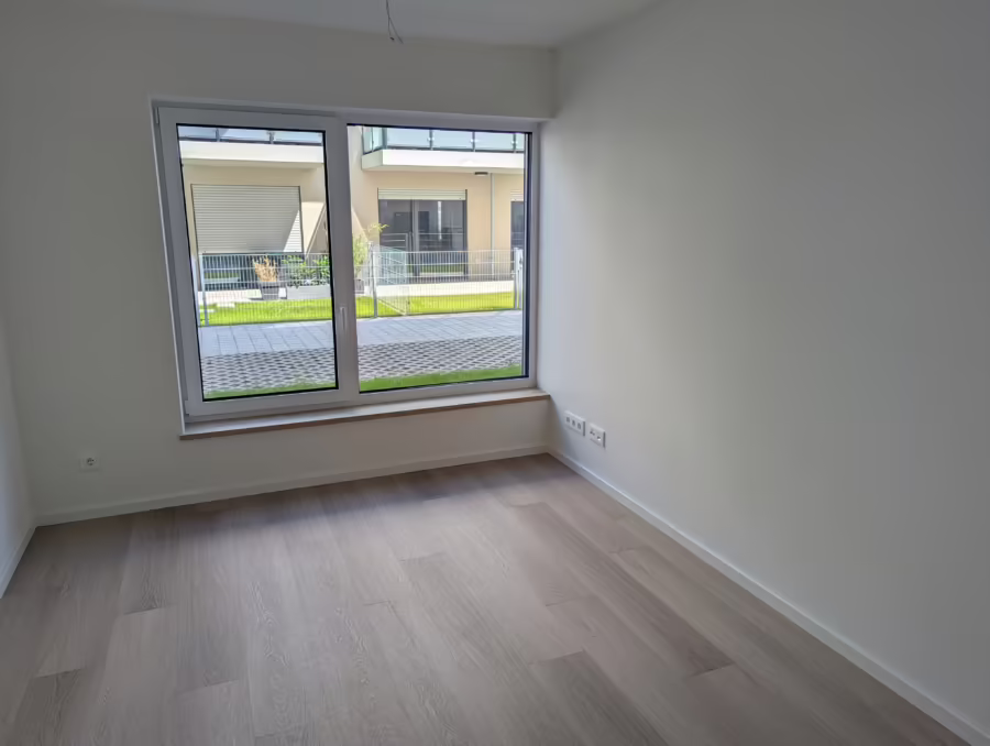 Neubauwohnung mit Garten, EinbaukĂĽche, Badewanne/Dusche nahe der Innenstadt! - Zimmer (69666)
