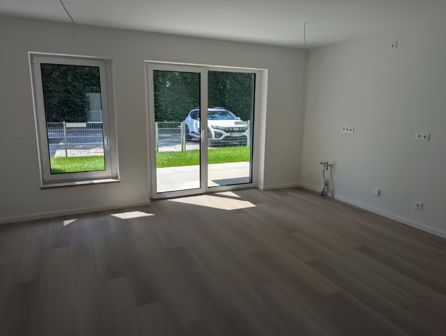 Neubauwohnung mit Garten in gefragter Lage naher der Innenstadt! - Wohnen/Essen/Kochen (71275)
